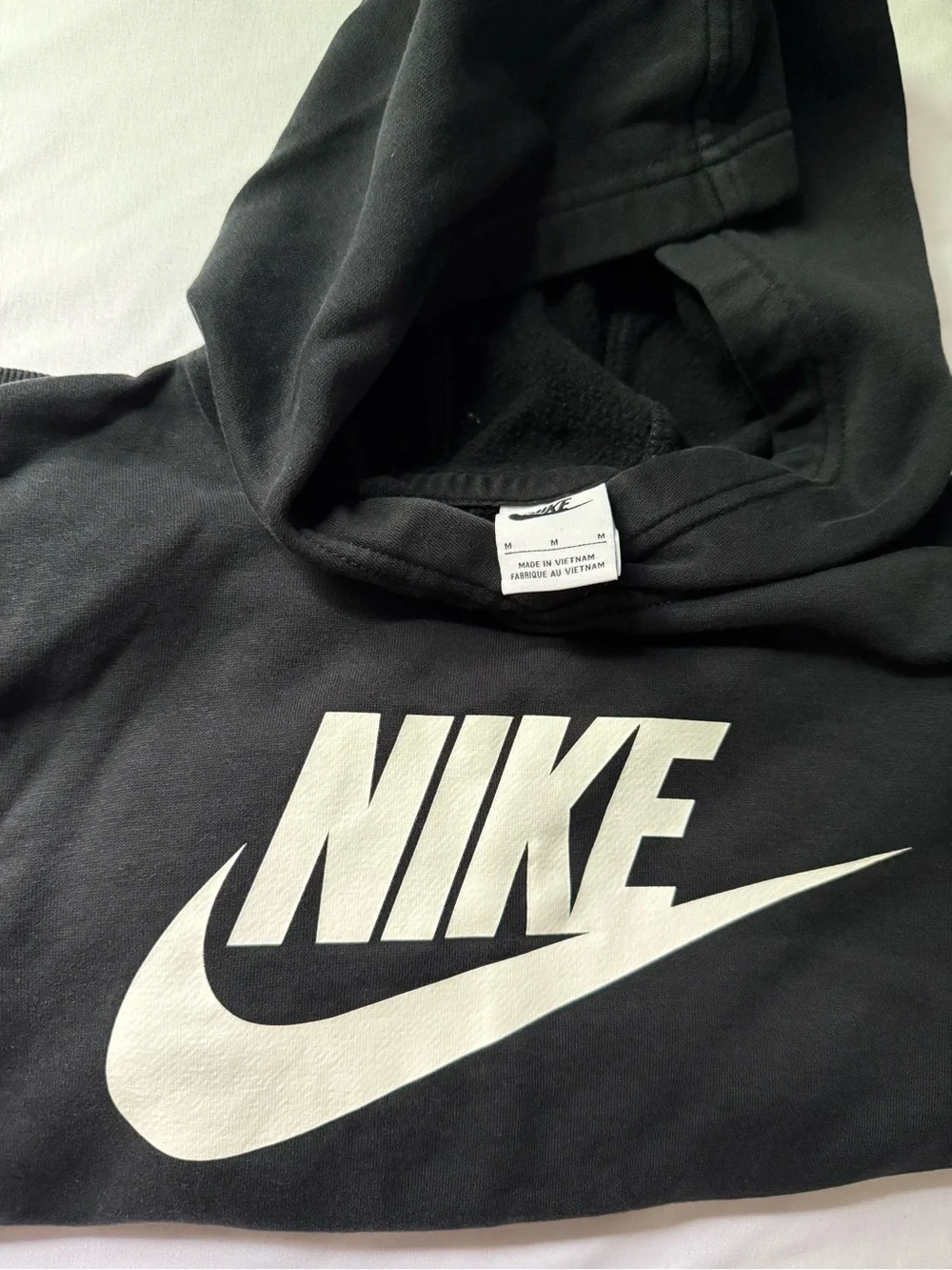 Nike Kids Black Hoodie with White Swoosh Logo